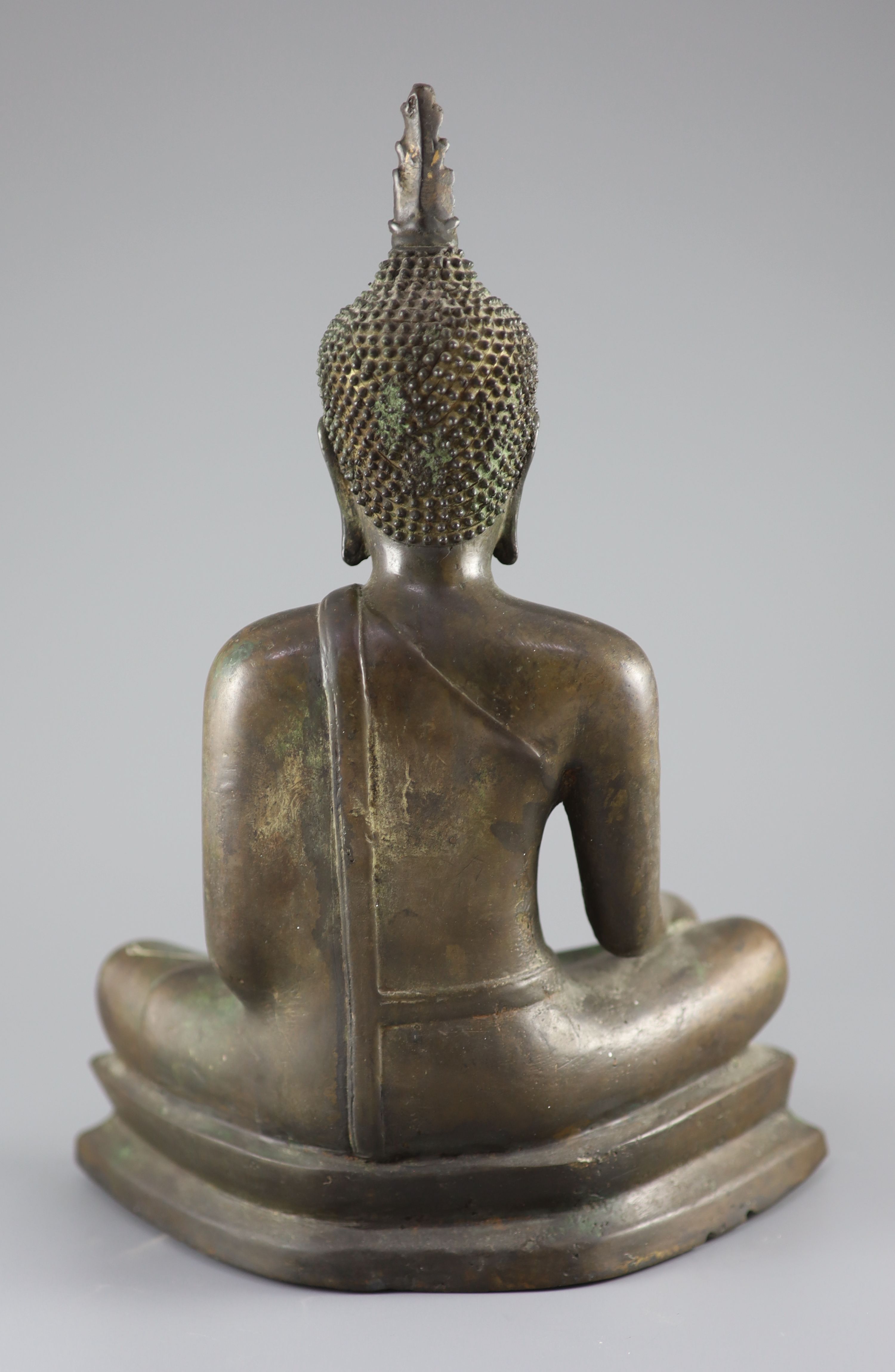 A large Thai bronze seated figure of Buddha Shakyamuni, Ayutthaya Period, 17th/18th century, 36 cm high